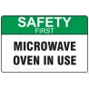 Microwave oven in use