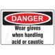 Wear gloves when handling acid or caustic