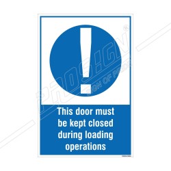 THIS DOOR MUST BE KEPT CLOSED DURING LOADING OPERATIONS